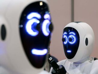 LONDON, ENGLAND - MAY 30: A pair of 1X androids are displayed at the International Conference on Robotics and Automation (ICRA) at ExCel on May 30, 2023 in London, England. The event is the IEEE Robotics and Automation Society's flagship conference and a forum for robotics researchers to present and discuss their work. (Photo by Leon Neal/Getty Images)